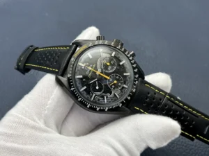 Watch resting in a gloved palm, dial turned to the left