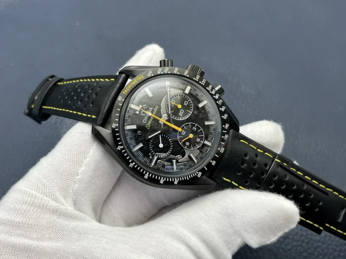 Watch resting in a gloved palm, dial turned to the left