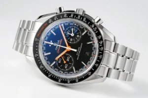 Seen from the left, black tachymeter bezel and blue dial