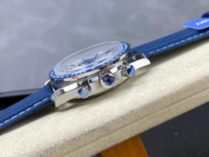 Crown side with the two pushers and blue strap