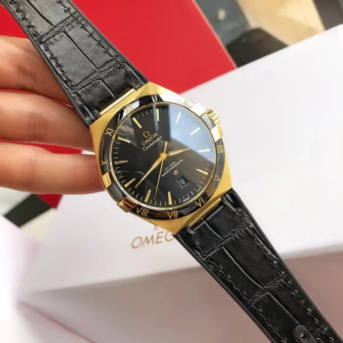 Dial macro showing yellow gold applied hour indices