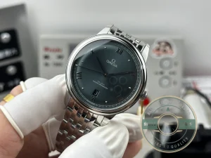 Omega De Ville Green on wrist in natural lighting