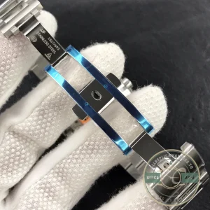 Complete front view showing blue dial and bezel ring