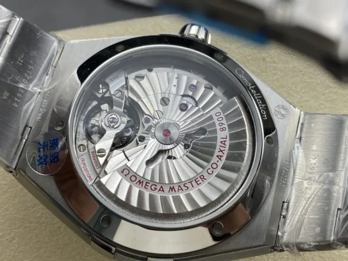 Caseback view showing Co-Axial movement through sapphire crystal