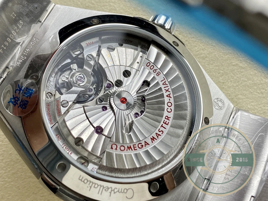 Caseback view showing Co-Axial movement through sapphire crystal