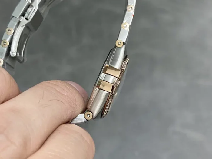 Close-up of steel bezel and dial markers