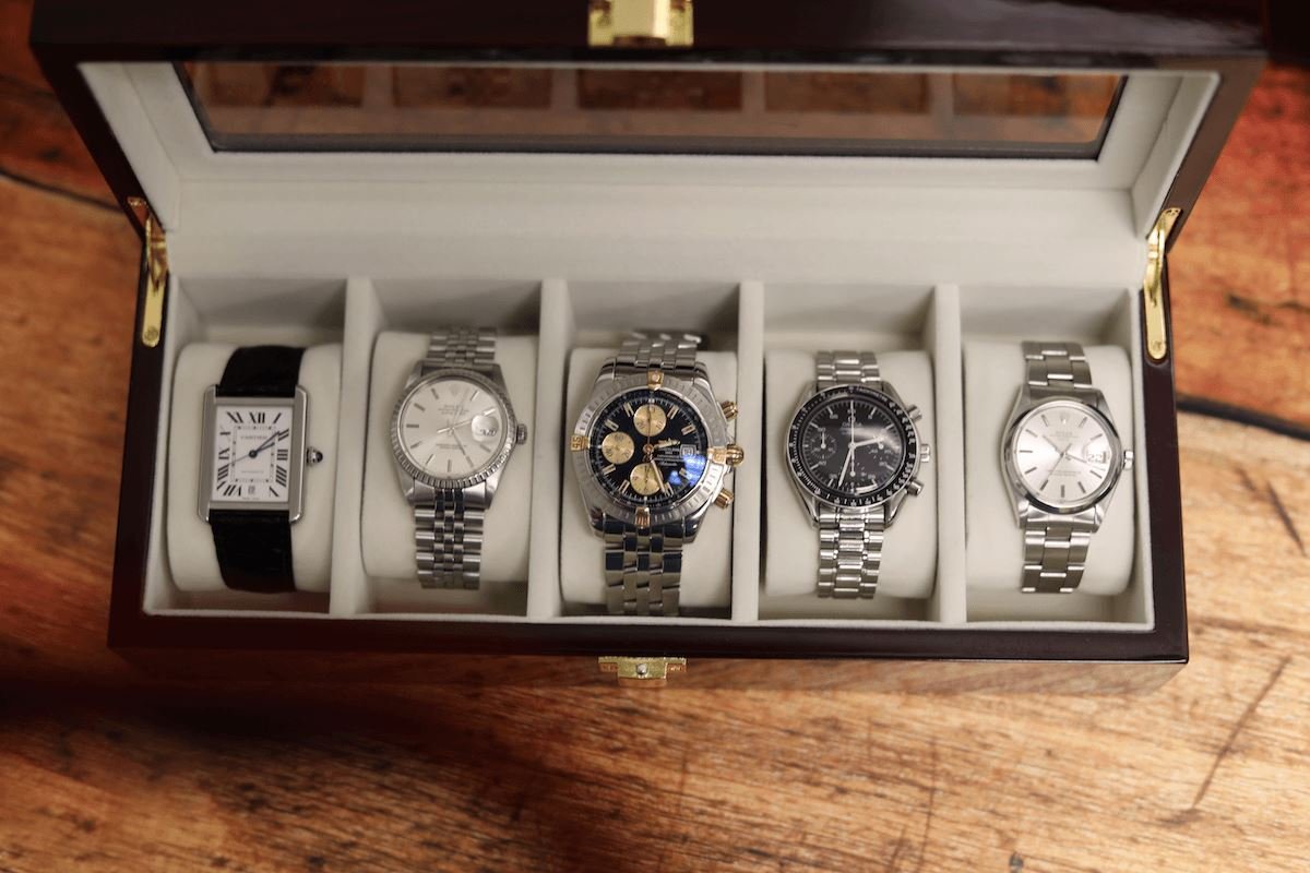 Luxury Swiss Watch Collection Display Omega Rolex