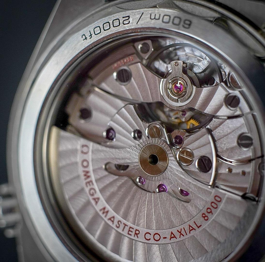 Omega Co-Axial Movement Decoration Close-Up Caseback Omega Co-Axial Movement Decoration Close-Up Caseback