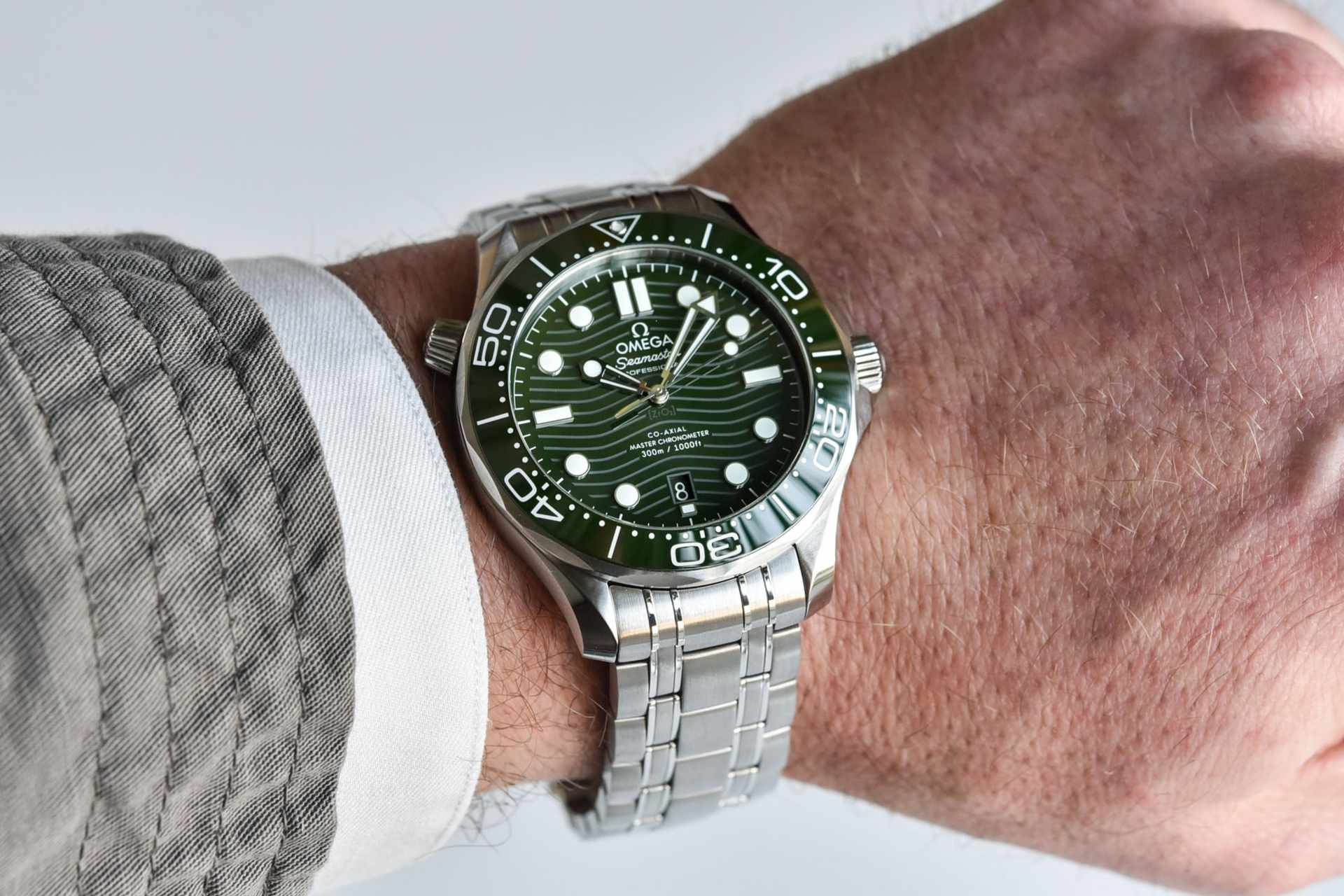 Omega Seamaster Diver 300M Green Dial Wave Pattern Ceramic Bezel Wrist Shot